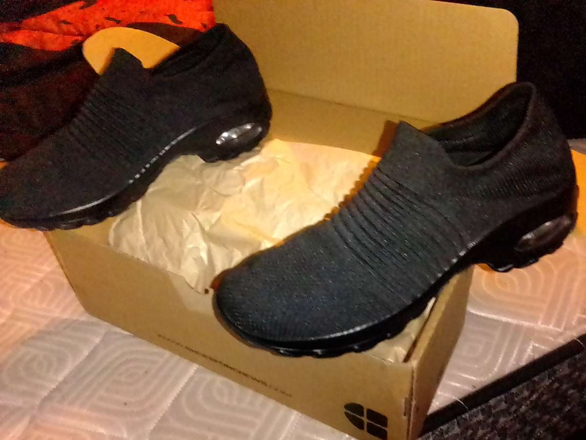 brand New womans  black slip on shoes size 9