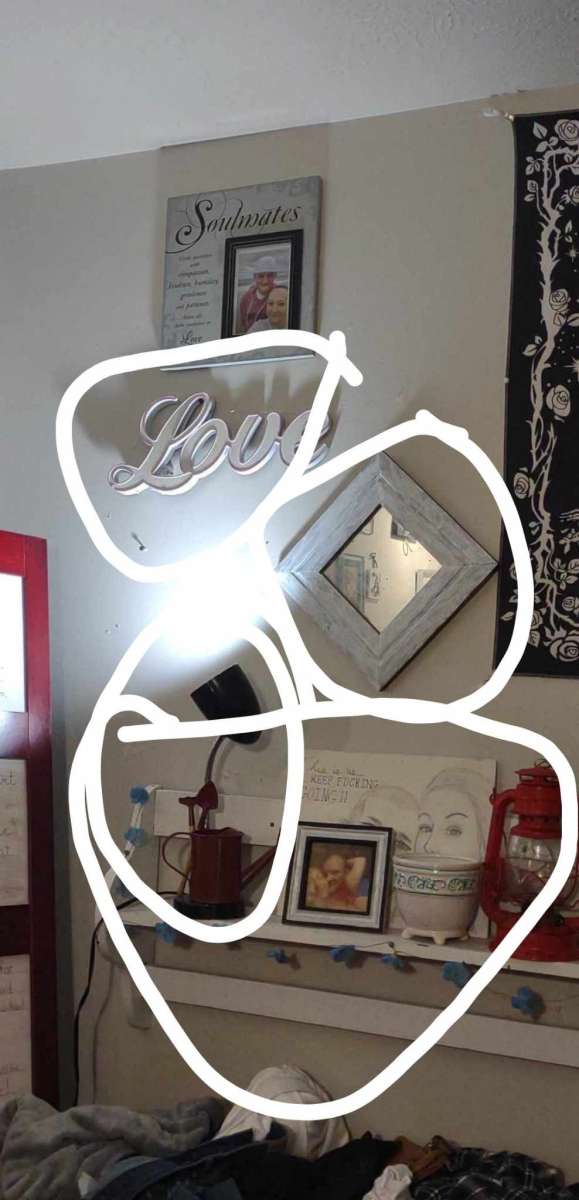 lamp red watering can and shovel and pitch fork