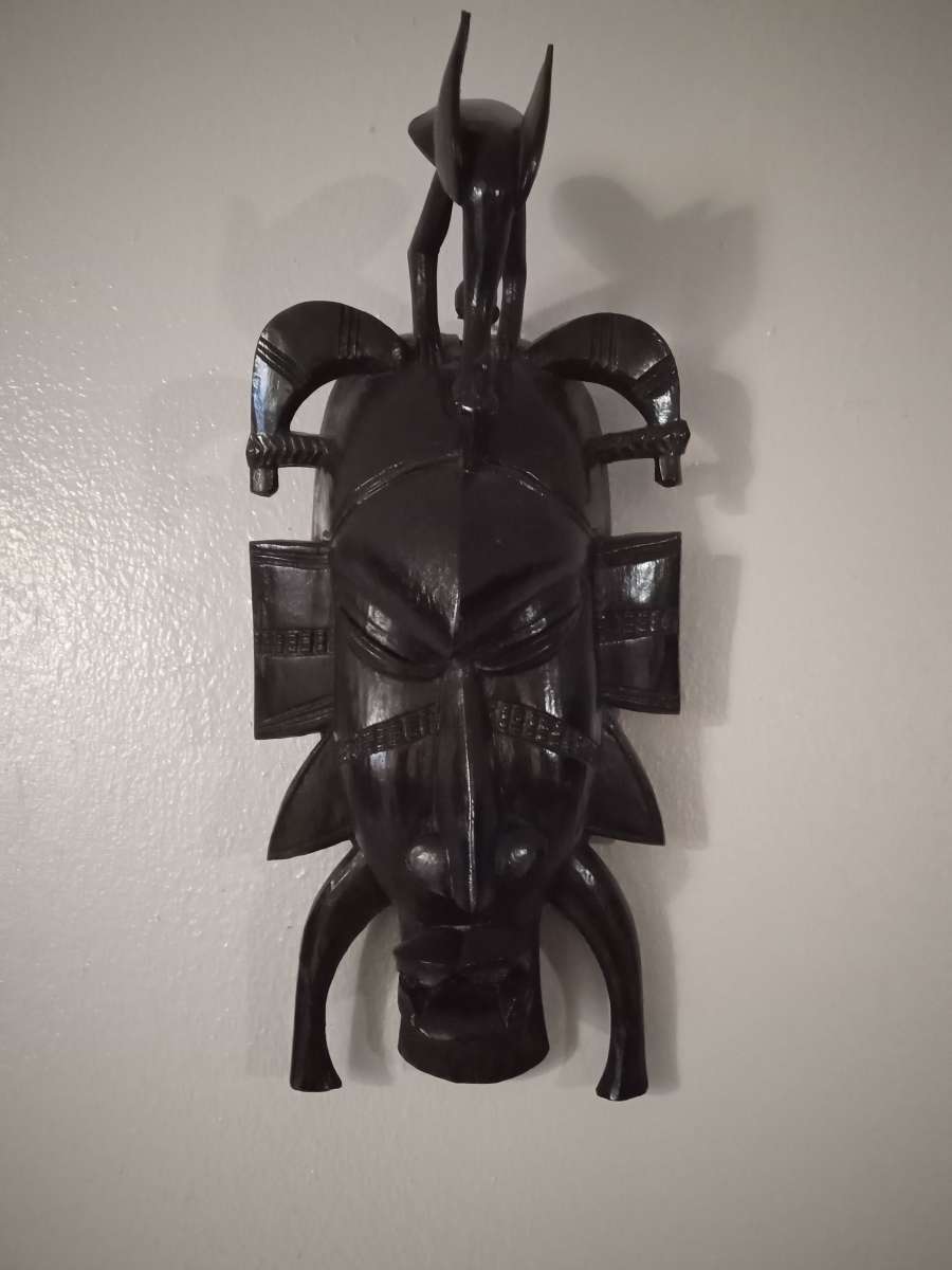 West African wood curved Female Statue