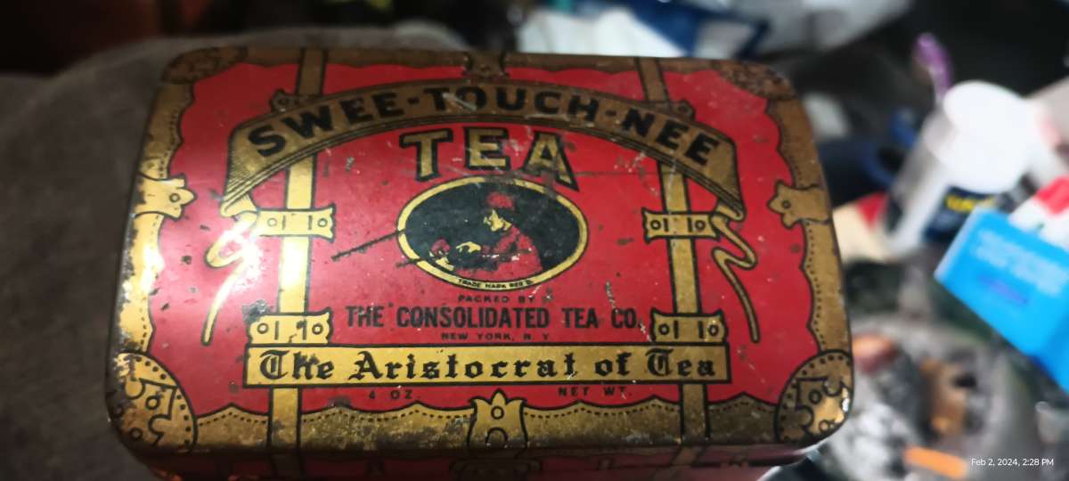 vintage tea tin used but clean readable