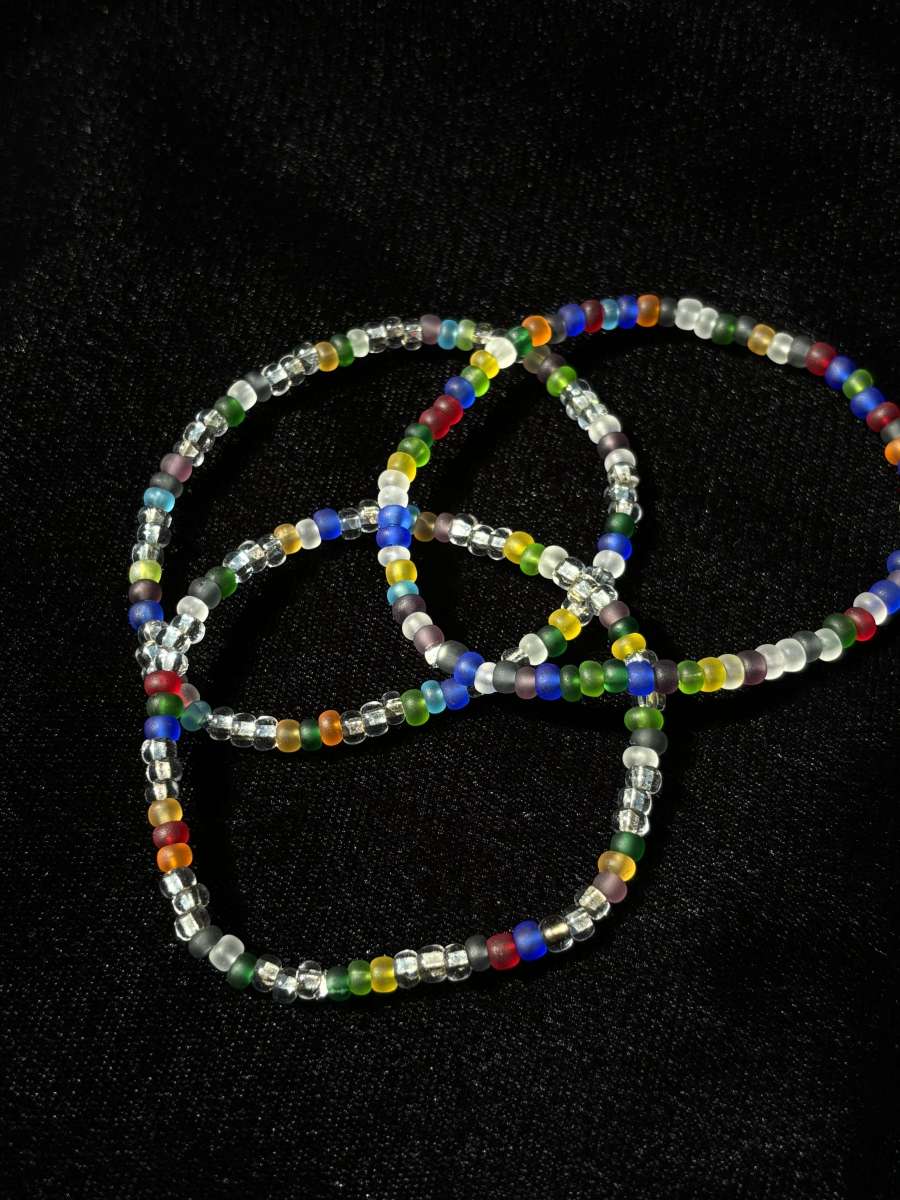 Set of 3 elastic rainbow and clear beaded bracelets