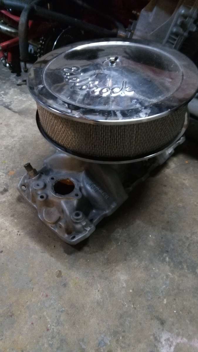 Edelbrock Carb 650 4 high Rise Intake and a 14 breather