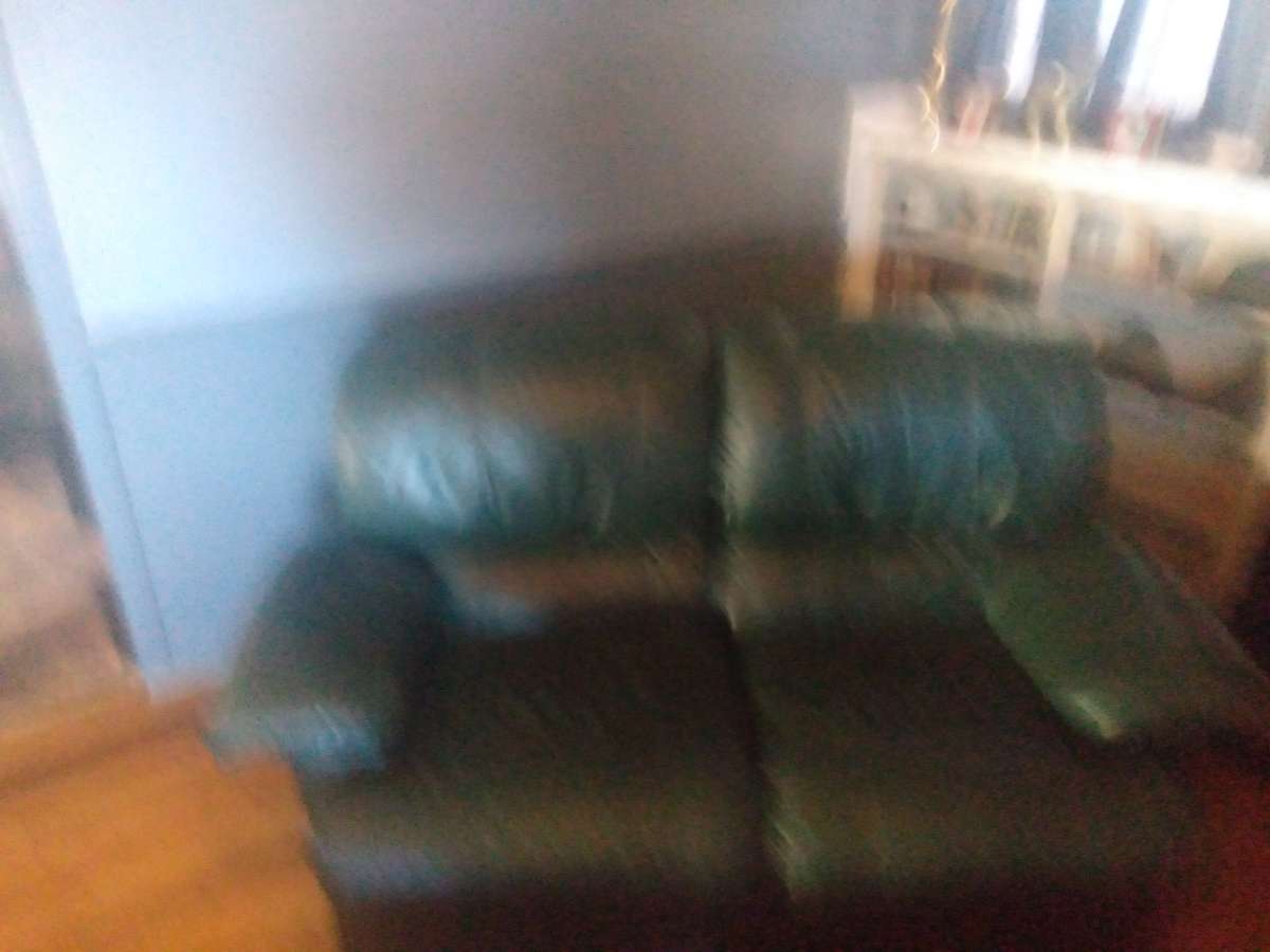 leather recliner on both sides very good condition