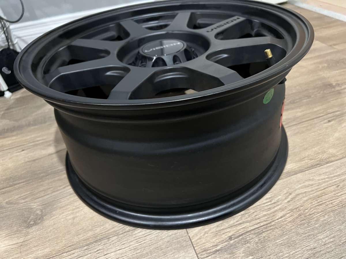 4 new identical matte black Vision rims