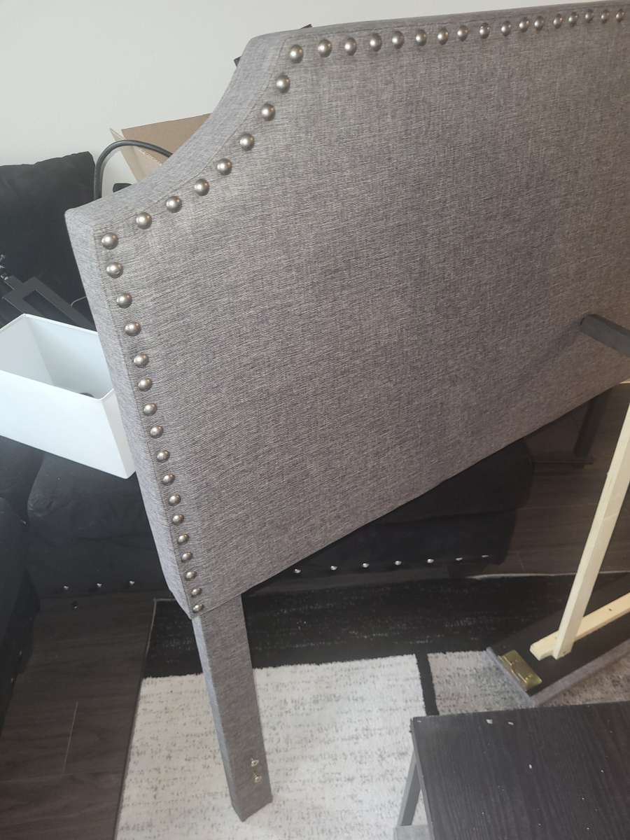 I am selling a Gray Queen Headboard and footboard bedframe