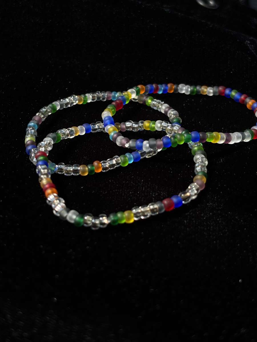 Set of 3 elastic rainbow and clear beaded bracelets