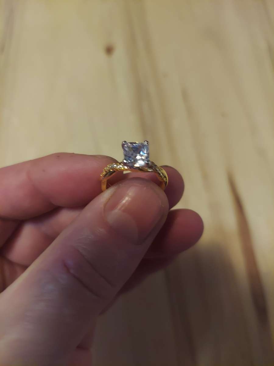 This is 14 Kgold over Sterling silver Its OK Size six