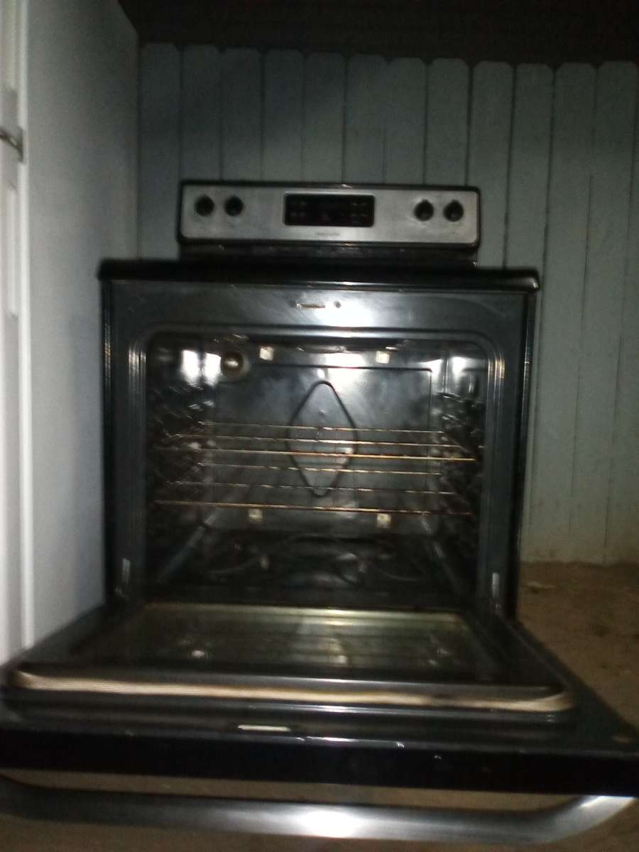 black and silver Frigidair stove