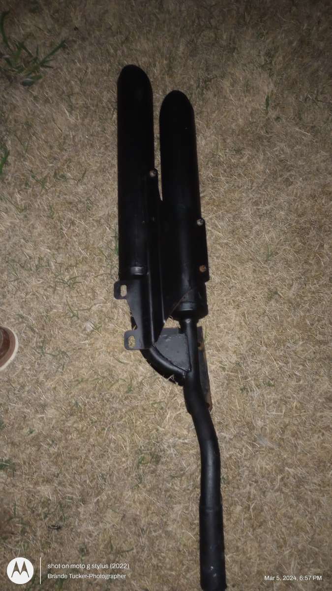 Black Straight Dual Exhaust for a motorcycle