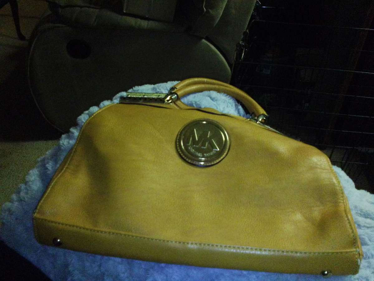 3 Michael kors purses