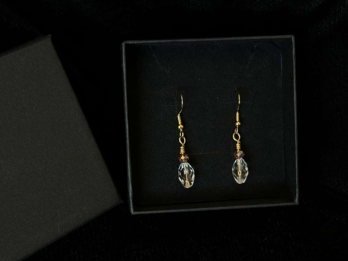 ambler and clear glass bead dangly earrings