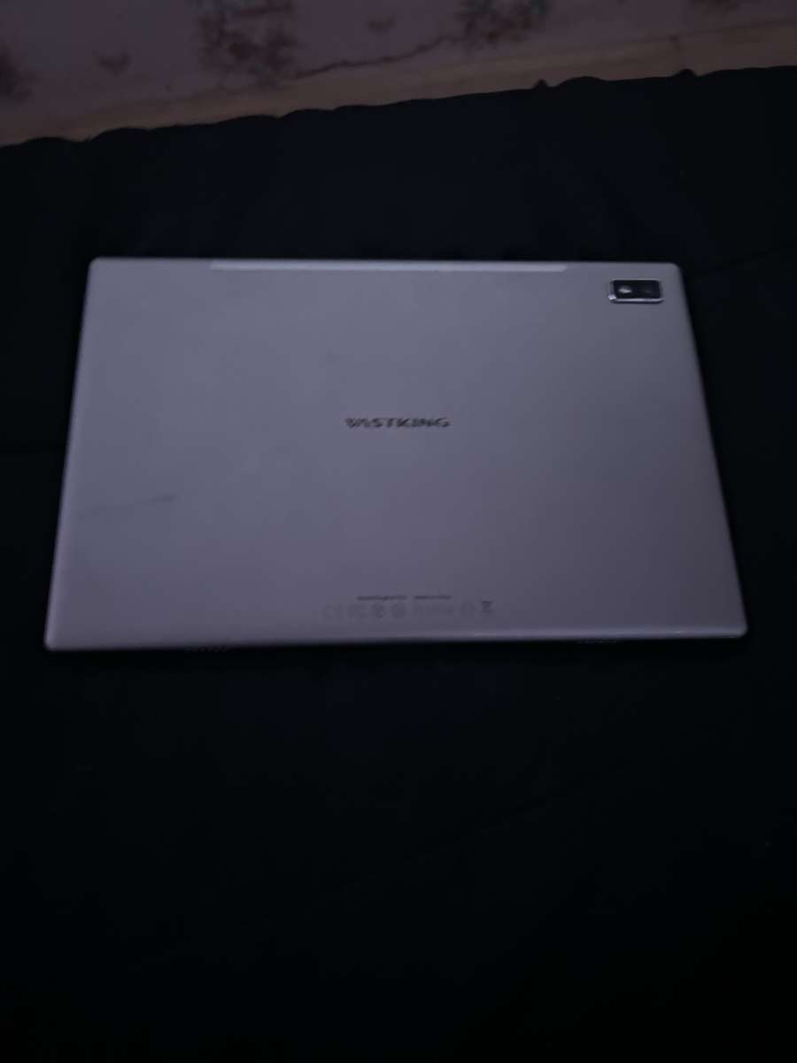 Tablet in good condition no scratches need a USB charger