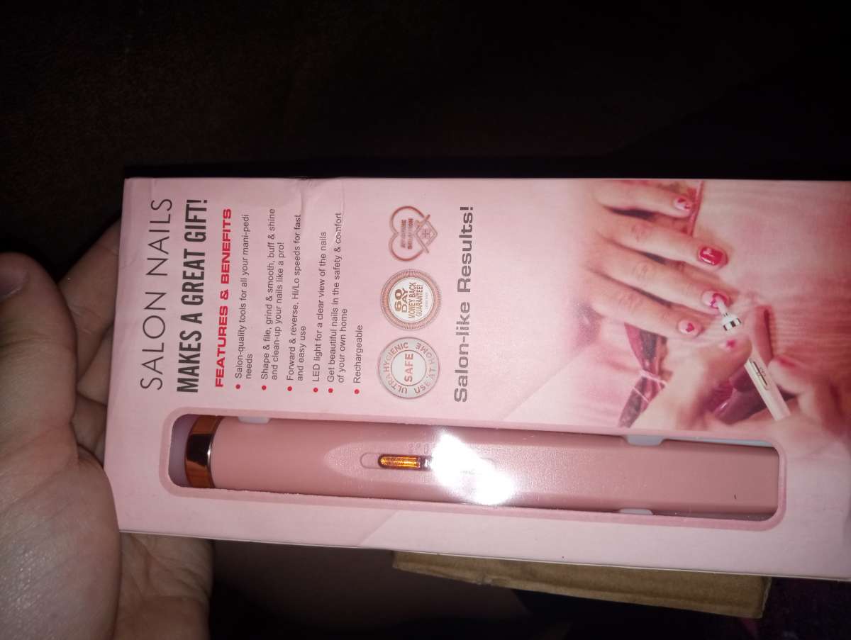 a woman nail file for fake nails