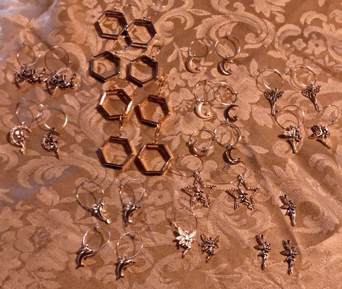 CLOTHES NECKLACES EARRINGS BRACELETS AND CHARM BRACELETS