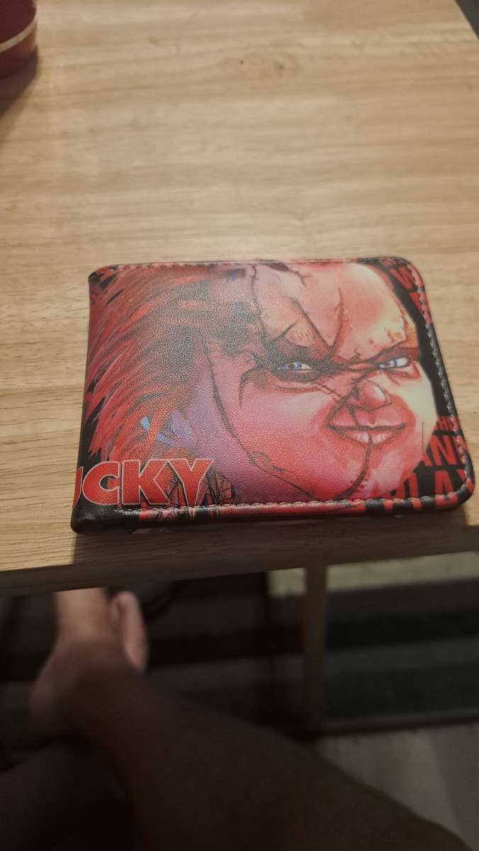chucky wallet  CASH ONLY  no exceptions