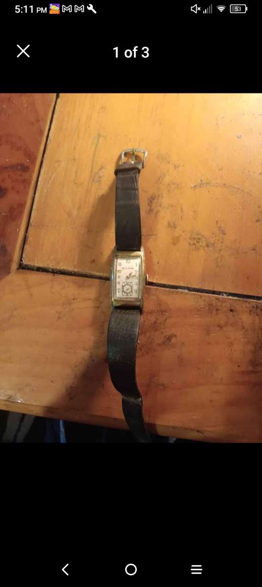 Dolls and Ventage bulova watch