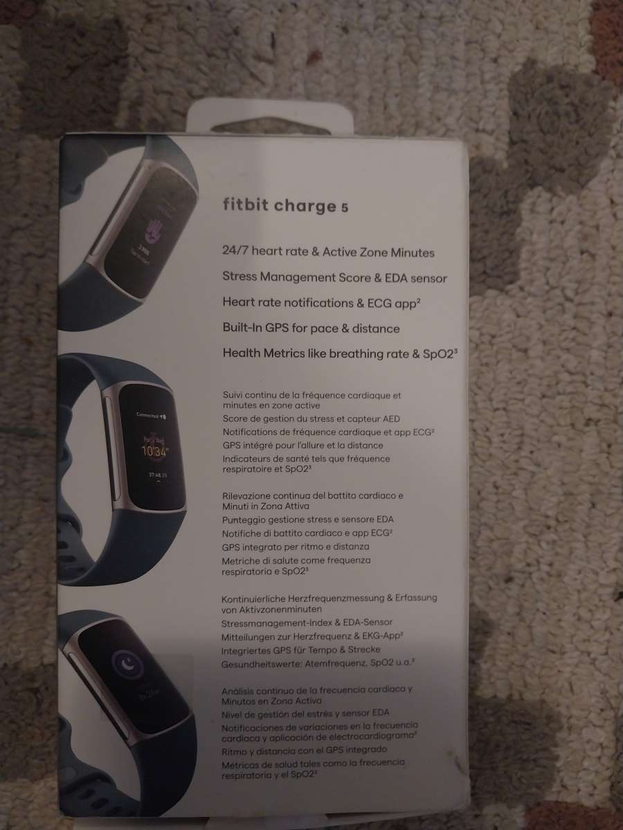 Brand New Fitbit Change 5 smartwatch with a extra