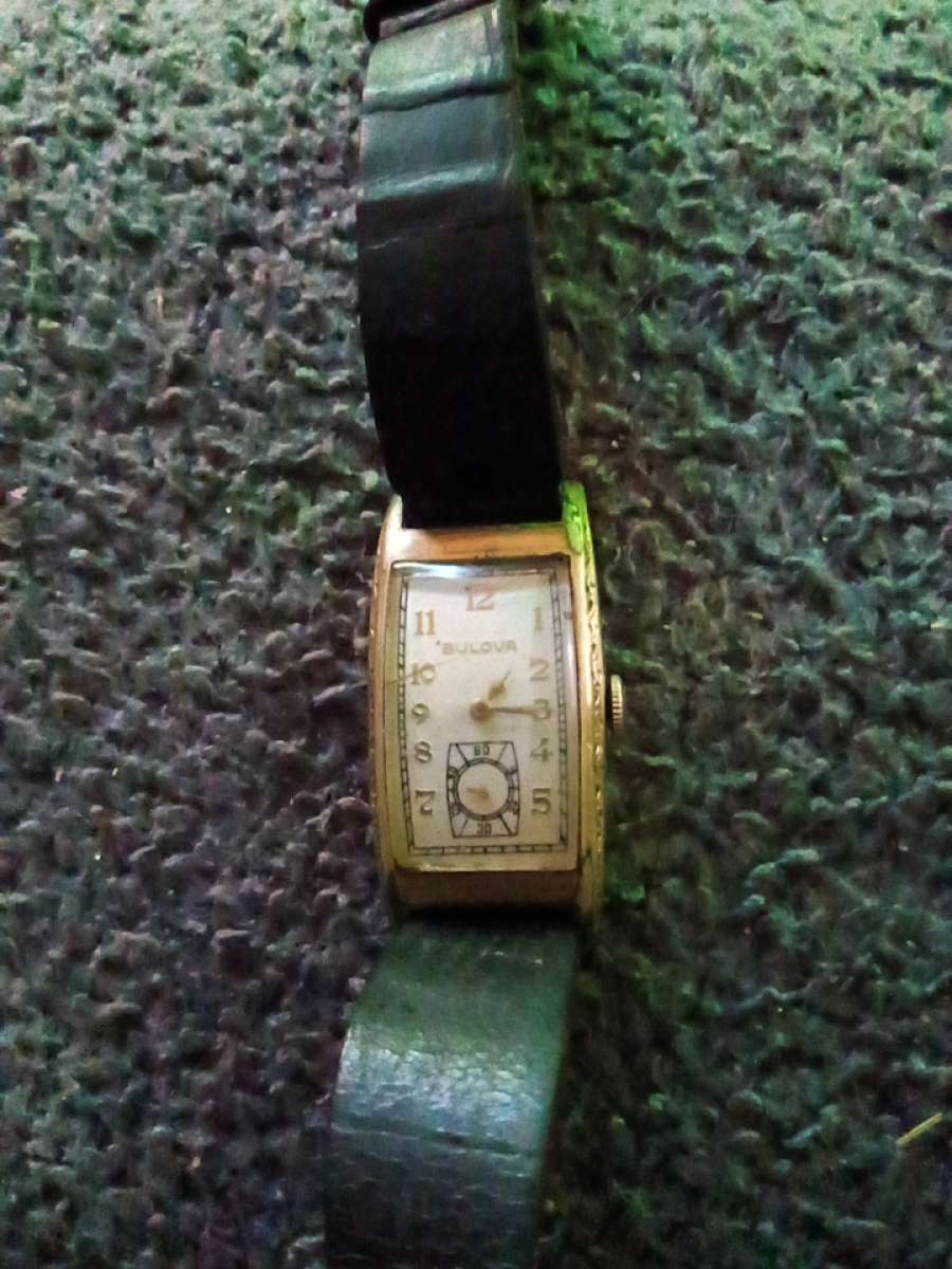 Dolls and Ventage bulova watch