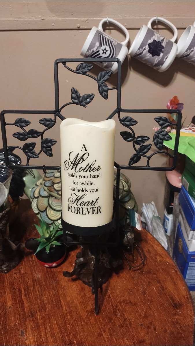 metal cross with candle for MomDad