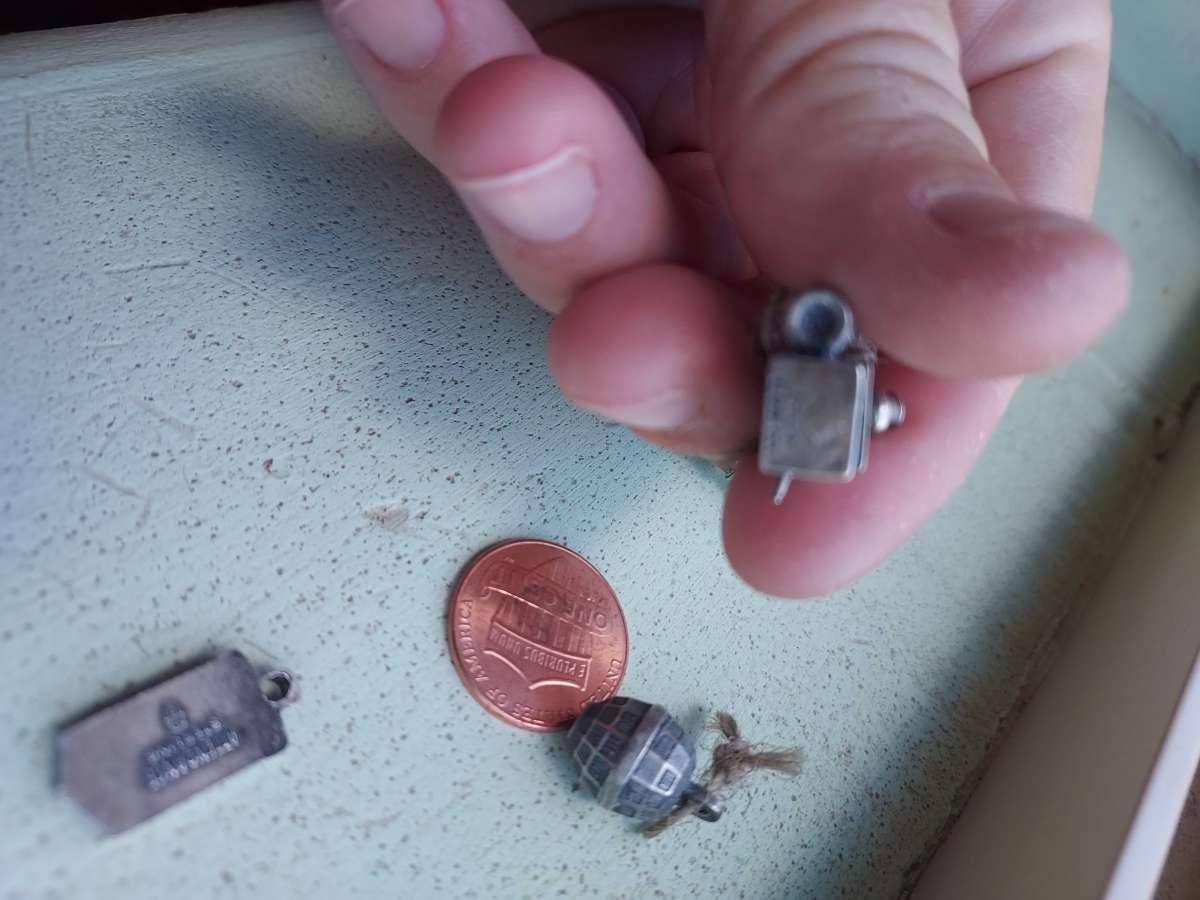 4 charms by the original BELL PHONE COMPANY