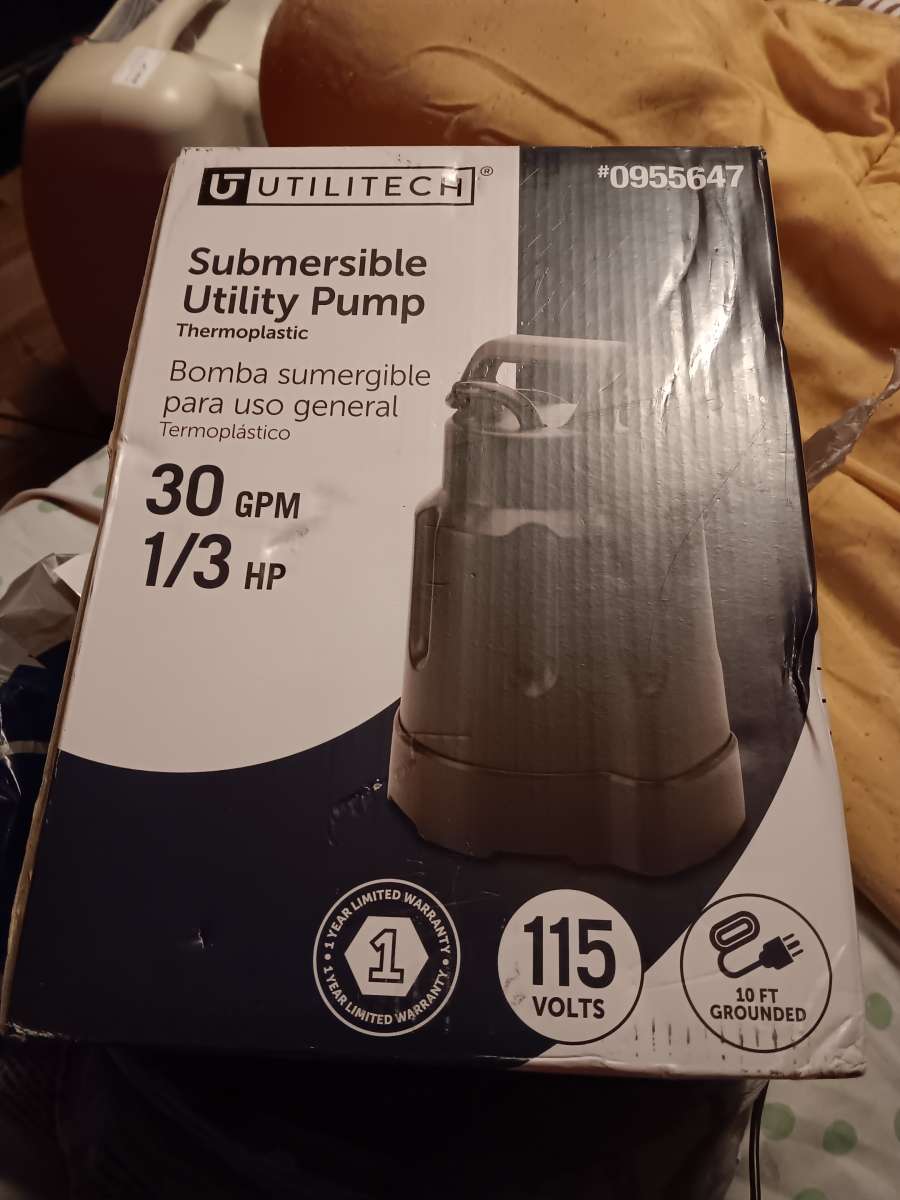 submersible  utility pump  30 gpm one third Hp brand new sti