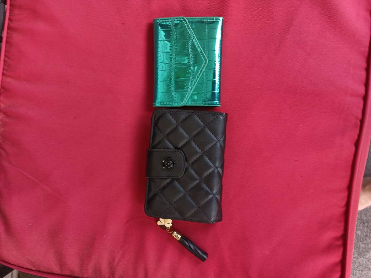 Two brand new wallets