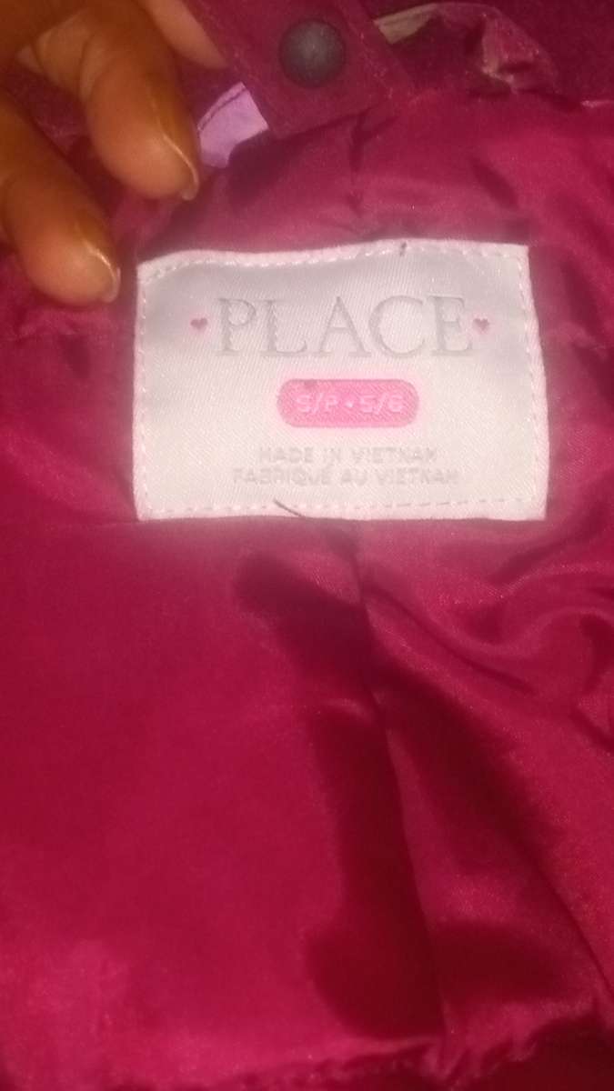 children place jacket that is brand new and a size 5