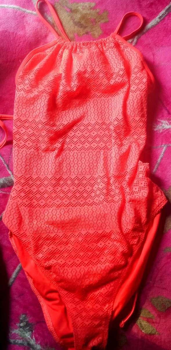 Bathing suits and two pair of sweats