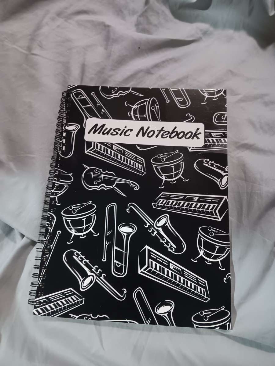 coloring book binder and music notebook