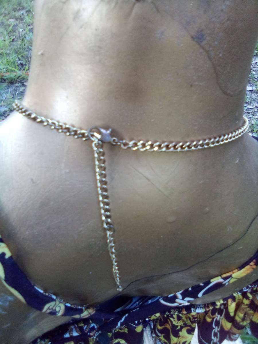 dangling White stoned gold necklace