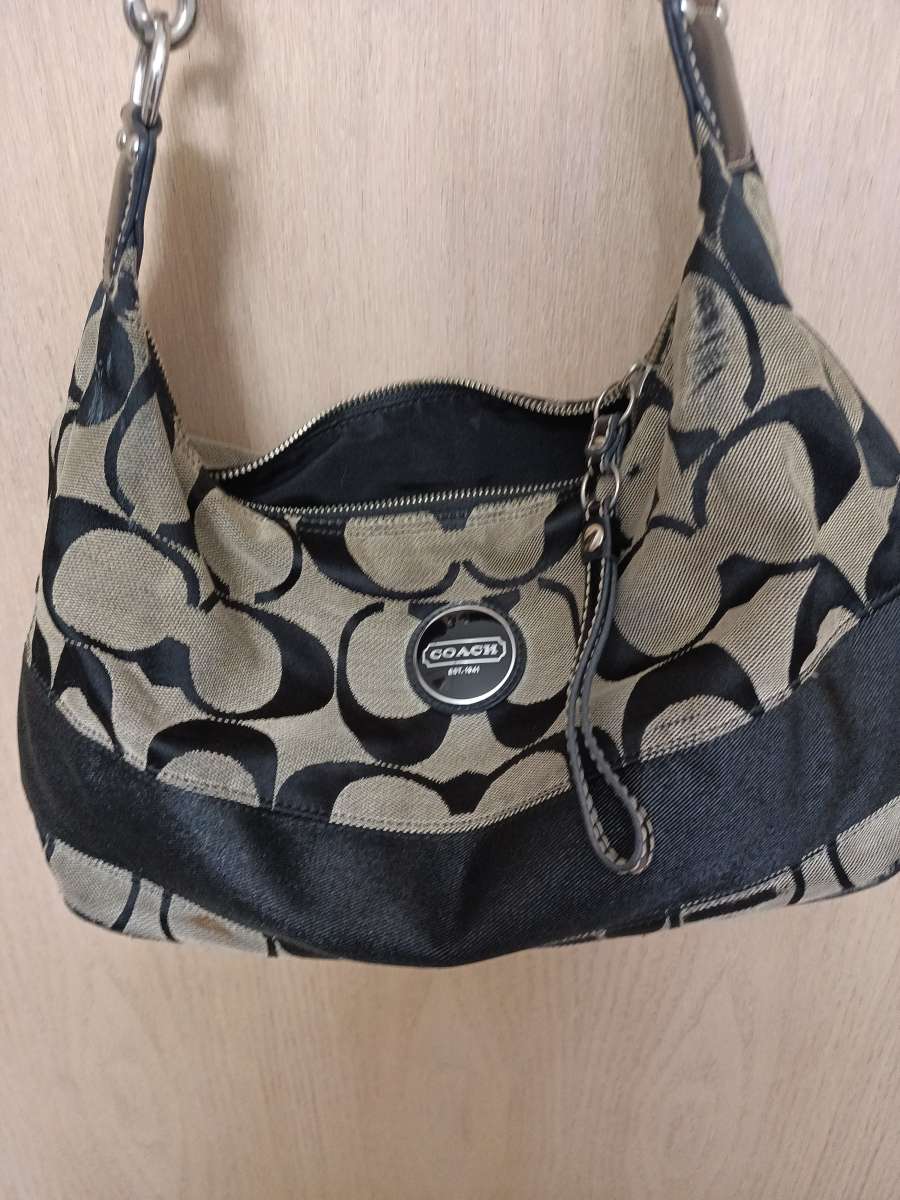 Coach beige and black canvas with leather trim