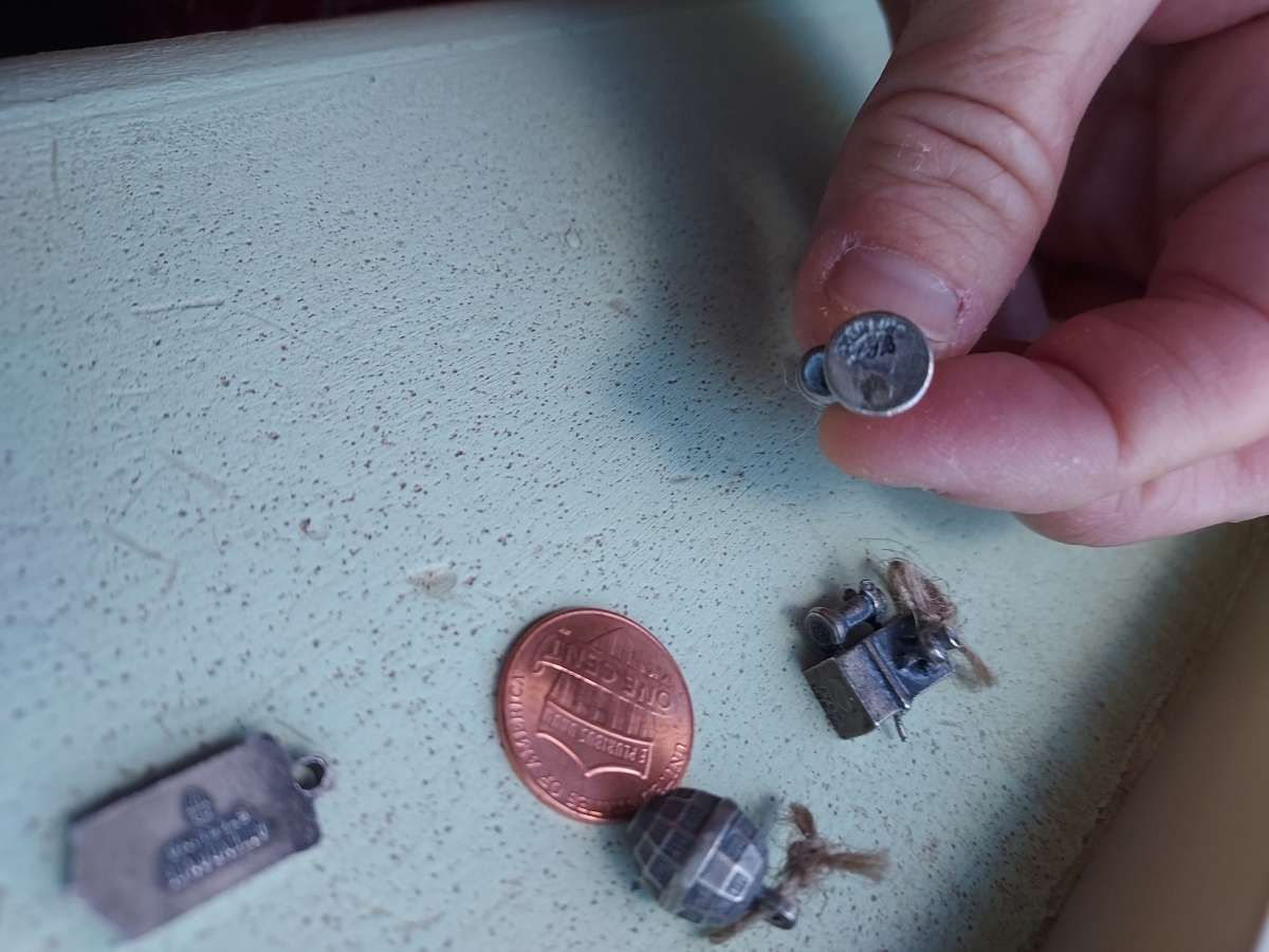 4 charms by the original BELL PHONE COMPANY