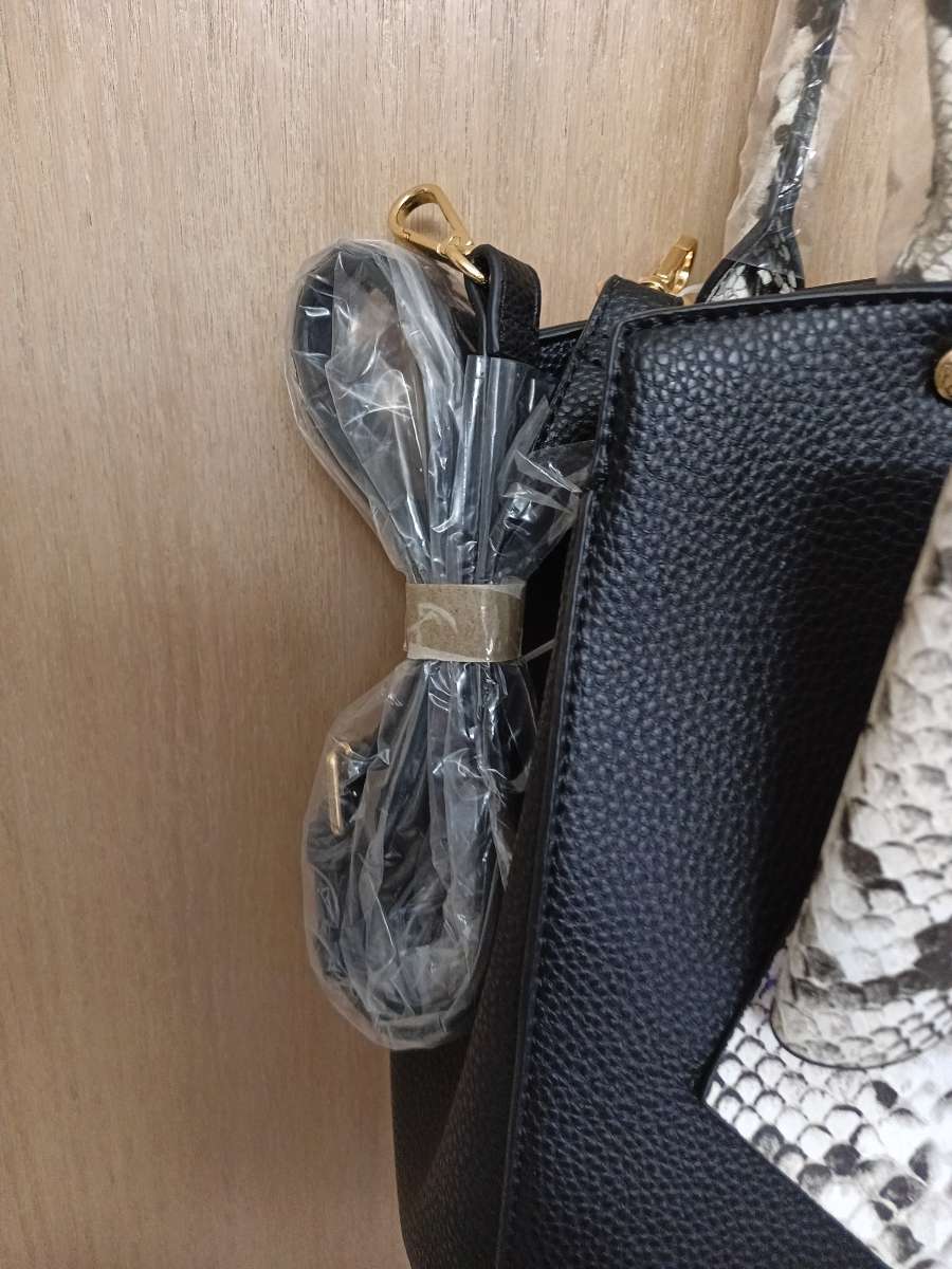 Like Dreams NWT unique purse