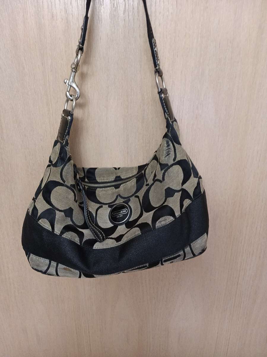 Coach beige and black canvas with leather trim