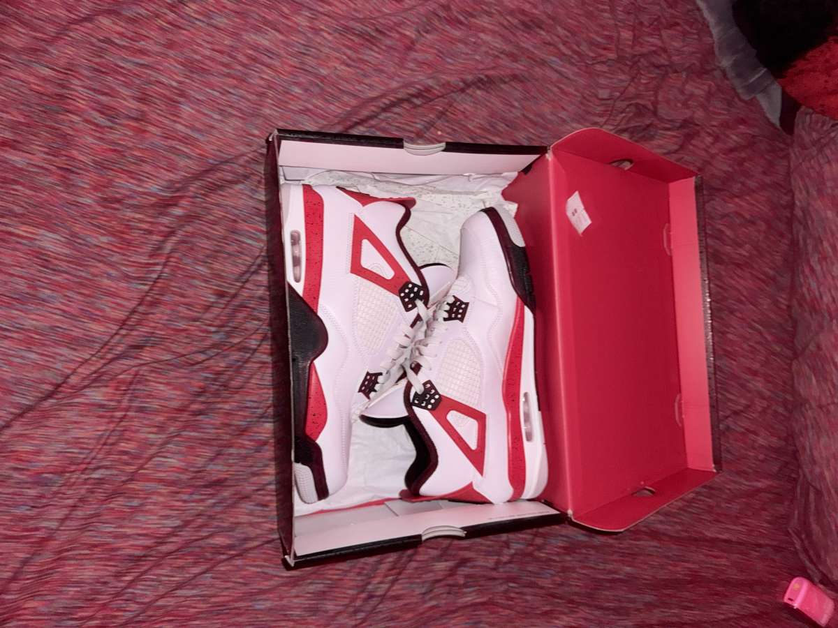 Jordan 4s red cement