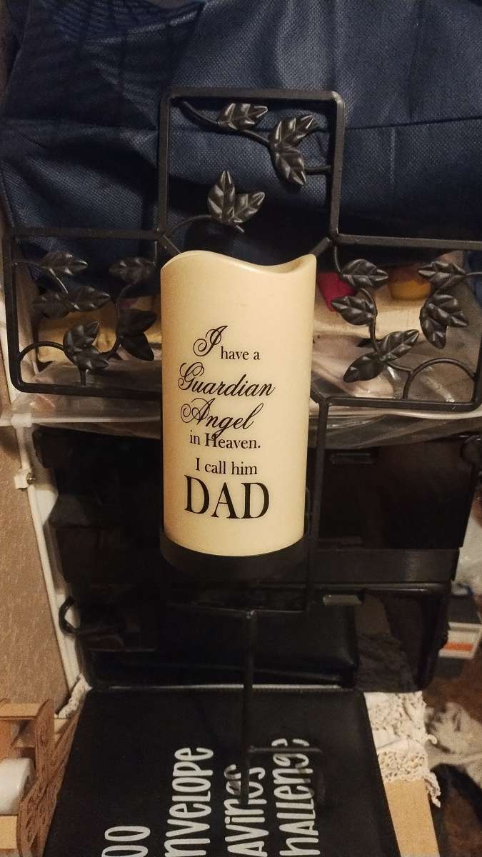 metal cross with candle for MomDad