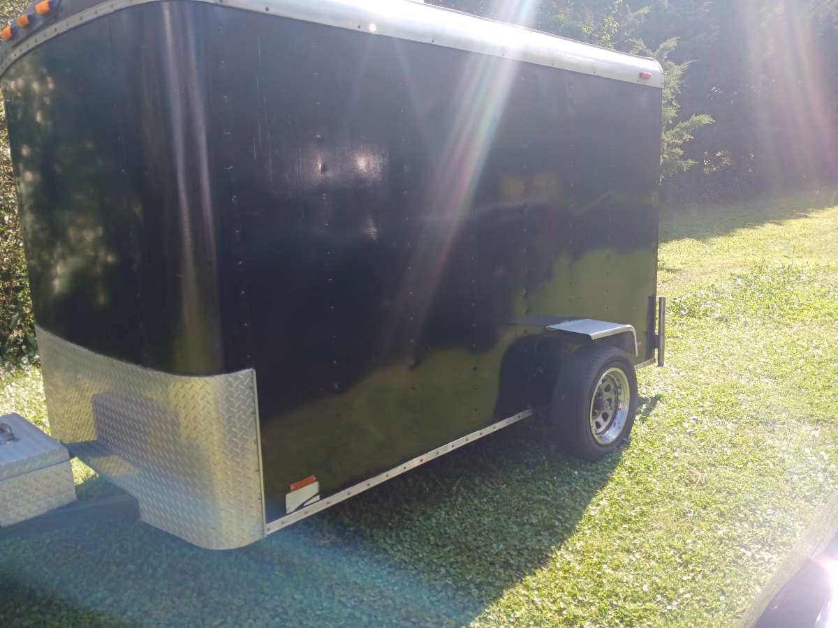 motorcycle trailer with 4 tracks in the floor spare tire