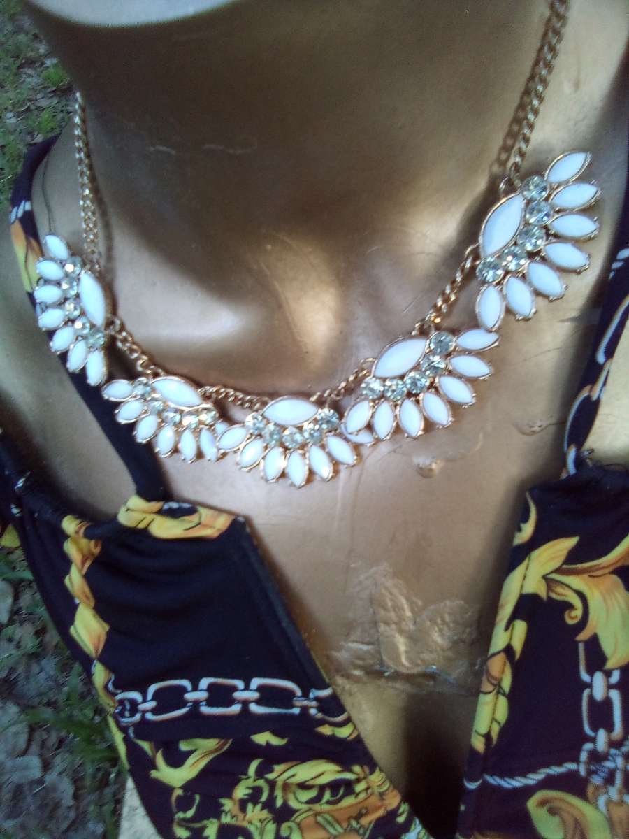 dangling White stoned gold necklace