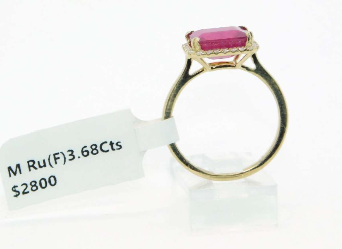 14k Gold Rudy  and diamonds   ring