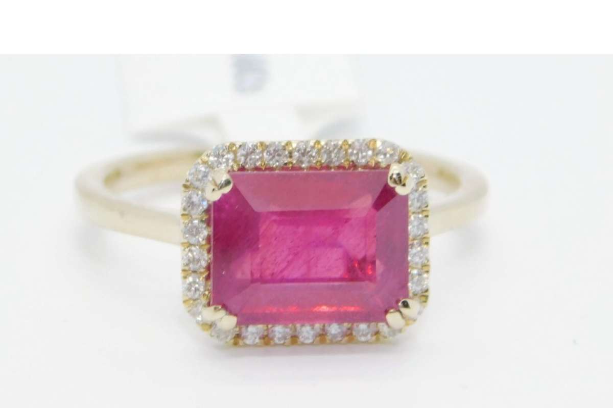 14k Gold Rudy  and diamonds   ring