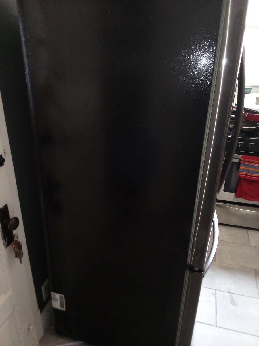 used and half working LG refrigerator