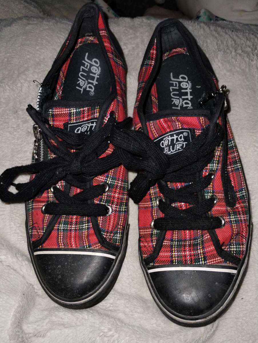 Red and black plaid sneakers by Gotta Flurt