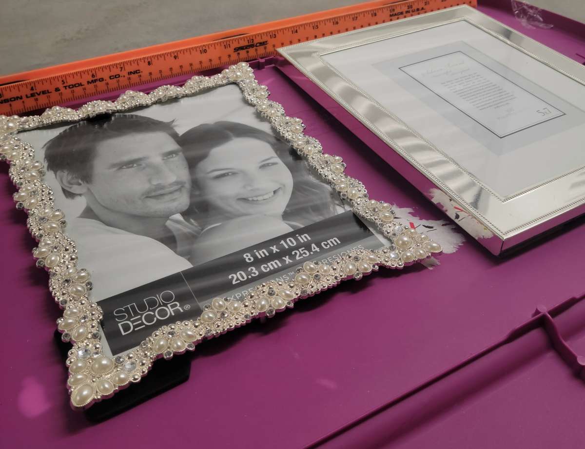 2  8x10 Photo Frames 1 Pearl and Embellished 1 Silver Mirror