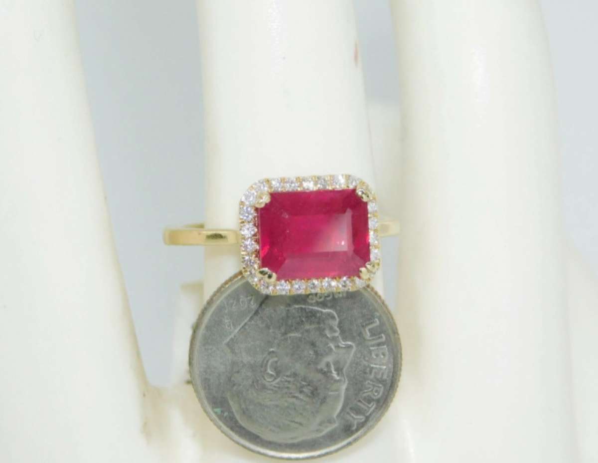 14k Gold Rudy  and diamonds   ring