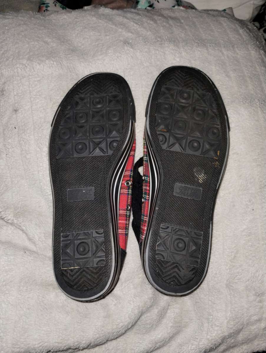 Red and black plaid sneakers by Gotta Flurt