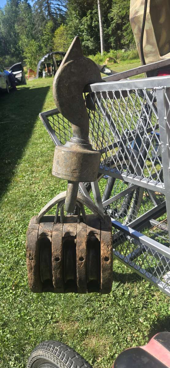 I have a huge wooden 3 wheel Barn pulley
