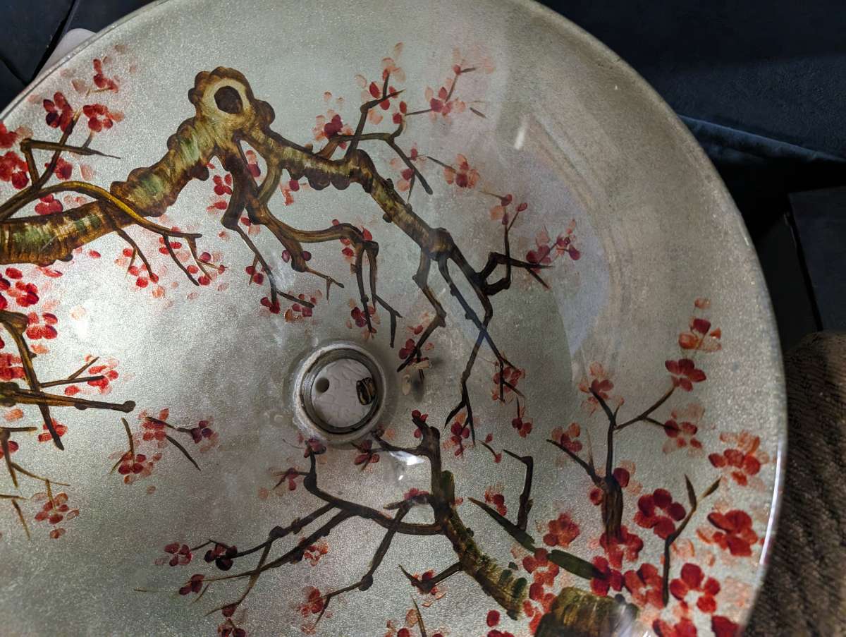 Vanity sink with a rose vine design