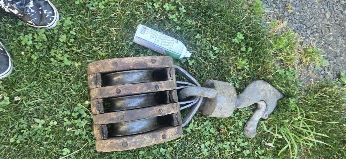 I have a huge wooden 3 wheel Barn pulley