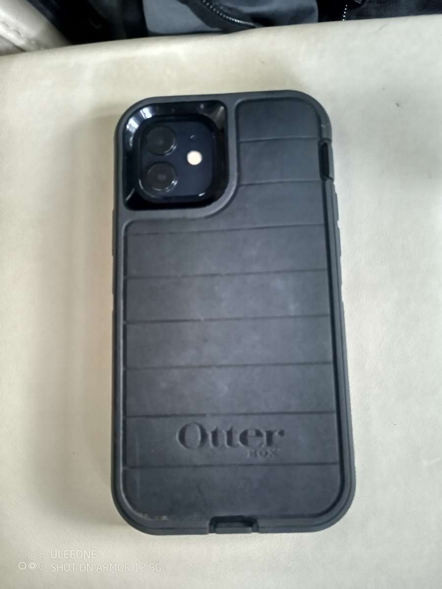 Black iPhone 12 With Black OtterBox Case