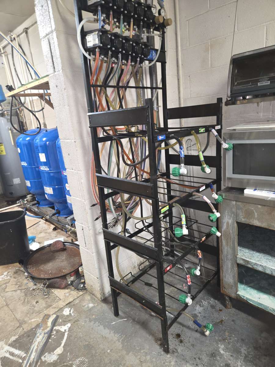 used Comm Soda Syrup rack